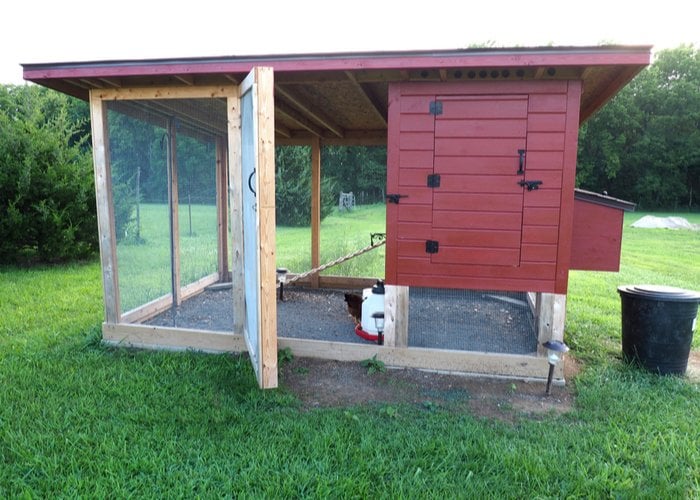 red chicken coop with run