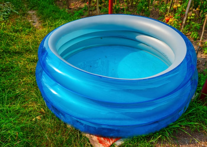 boredom buster idea for your goats - kiddie pool